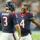 Tom Savage, No. 3 of the Houston Texans, is congratulated by Deshaun Watson, No. 4, after throwing a touchdown pass in the first quarter at NRG Stadium in Houston on Aug. 19, 2017. (Bob Levey/Getty Images)